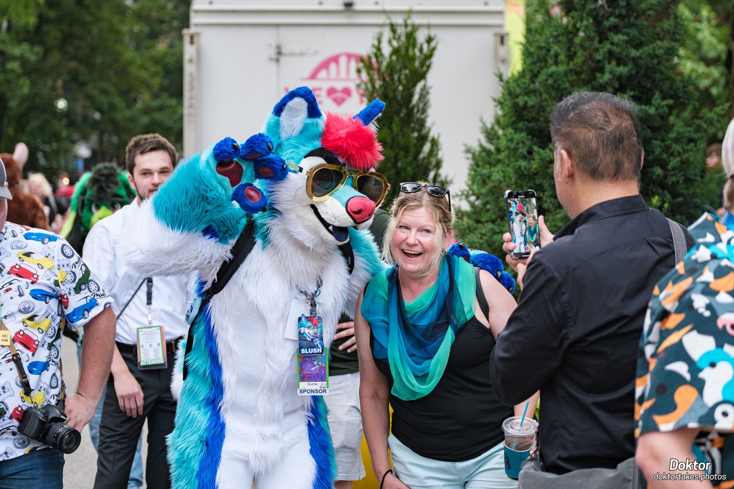 A fursuiter waving at the Anthrocon 2025 Block Party.